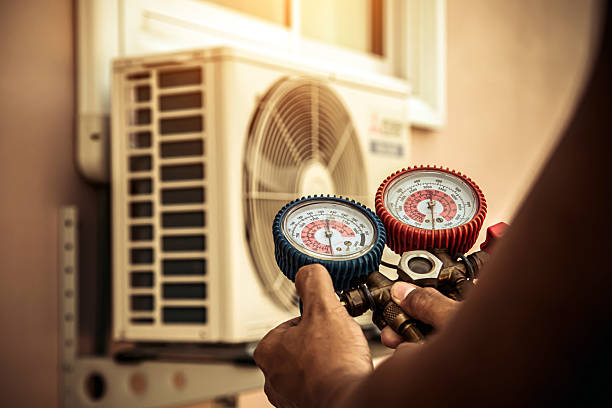 Professional Hvac technician working in La Belle, PA